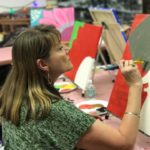carol: Carol painting an elephant (note: she’s not thinkin’ “Roll Tide” with this one)