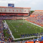 Players on the field at Ben Hill Griffin Stadium^ also known as The Swamp - home of the University of Florida Gators during an SEC football game.