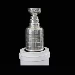 NHL Trophy - Silver Stanley Cup on white stand with black background^ in Vancouver BC on November 3^ 2018