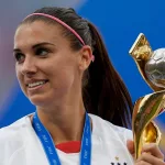 Alex Morgan lifts the trophy after winning the 2019 FIFA Women's World Cup France Final match between The United State of America and The Netherlands at Stade de Lyon on July 7^ 2019 in Lyon^ France.