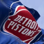 Detroit Pistons flag waving on a clear day. American professional basketball team^ Central Division of the Eastern Conference. Illustrative editorial 3d illustration render
