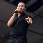 John Legend performs onstage at the 2015 New Orleans Jazz and Heritage Festival. New Orleans^ Louisiana - April 25^ 2015