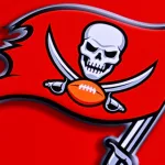 Tampa Bay Buccaneers . Logo of NFL club on red background