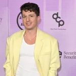 Charlie Puth at the 2022 American Music Awards at the Microsoft Theatre. LOS ANGELES^ CA. November 20^ 2022