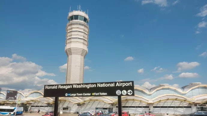 Control Tower^ National Airport seen from Metro Station platform. Ronald Reagan National Airport^ aka DCA^ is actually in Arlington^ three miles from DC. ARLINGTON^ VIRGINIA - OCT. 12^ 2017