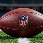 Outdoor photo of NFL football in the middle of the field