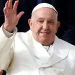 Pope Francis waves to the faithful at the end of his weekly general audience in St. PeterÕs Square at the Vatican^ November 13^ 2024.