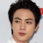 Jin of boy band BTS arrives for the KIIS FM's iHeartRadio Jingle Ball at the Forum Los Angeles in Inglewood^ CA Los Angeles^ California / USA - December 6 2019
