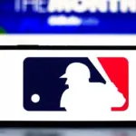 Selective focus of the MLB (Major League Baseball) logo. It is the premier professional baseball league in North America