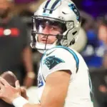 Carolina Panthers quarterback Bryce Young (9) warms up before the game against the Atlanta Falcons on January 5^ 2025 at Mercedes-Benz Stadium.