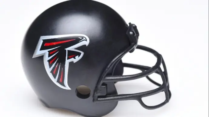 Mini Collectable Football Helmet for the Atlanta Falcons of the National Football Conference South.