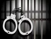 wpid-arrest-7-handcuffs-on-left-with-cell-bars-1-jpg-3