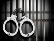 wpid-arrest-7-handcuffs-on-left-with-cell-bars-1-jpg-7