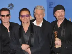 U2 with Bono & The Edge in the press room at the 71st Annual Golden Globe Awards LOS ANGELES^ CA - JANUARY 12^ 2014