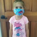 Hunter loves Poppy from Trolls...... If you have to wear a mask, make it FUN!
