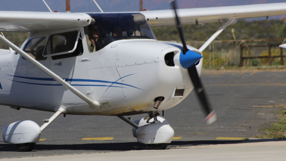 4 people killed when 2 small planes collide mid-air at North Las