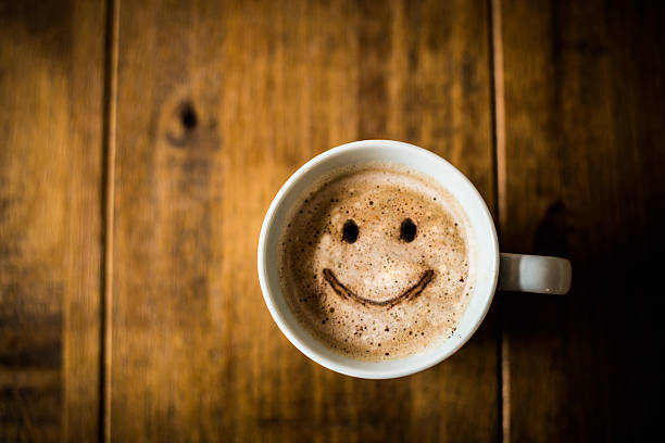 a-sad-looking-coffee-cup-on-a-brown-rustic-table