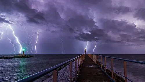 port_and_lighthouse_overnight_storm_with_lightning_in_port-la-nouvelle