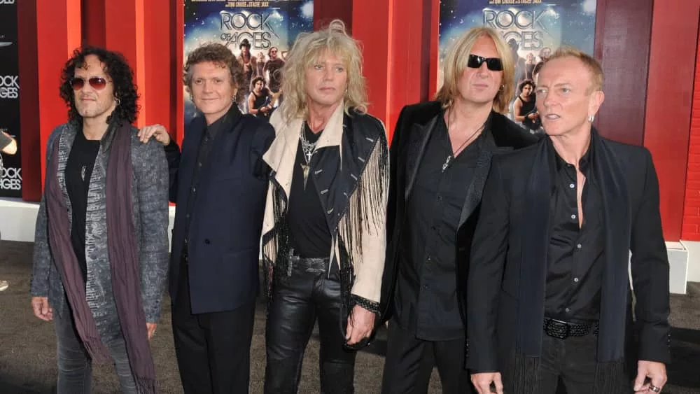 Def Leppard at the world premiere of "Rock of Ages" at Grauman's Chinese Theatre^ Hollywood. June 9^ 2012 Los Angeles^ CA