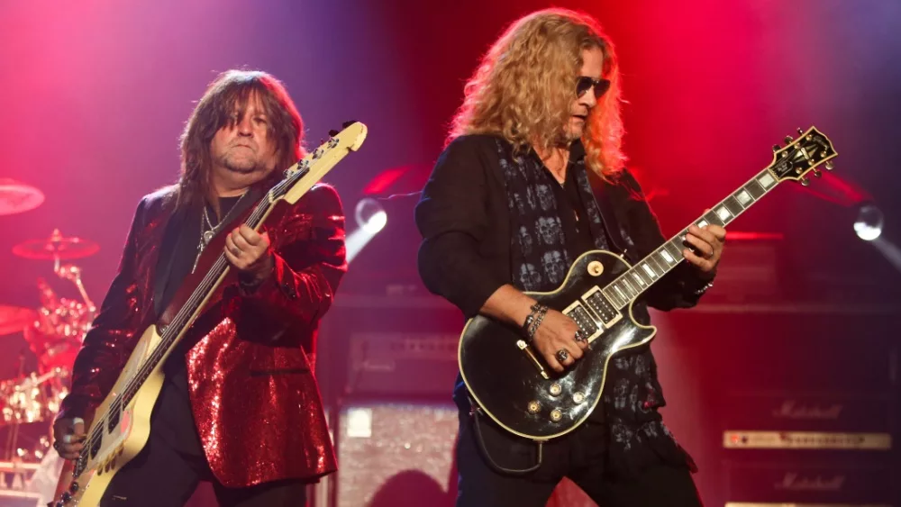 Brian Wheat (L) and Frank Hannon of Tesla performs onstage at the Paramount on October 25^ 2018 in Huntington^ New York. HUNTINGTON^ NY - OCT 25