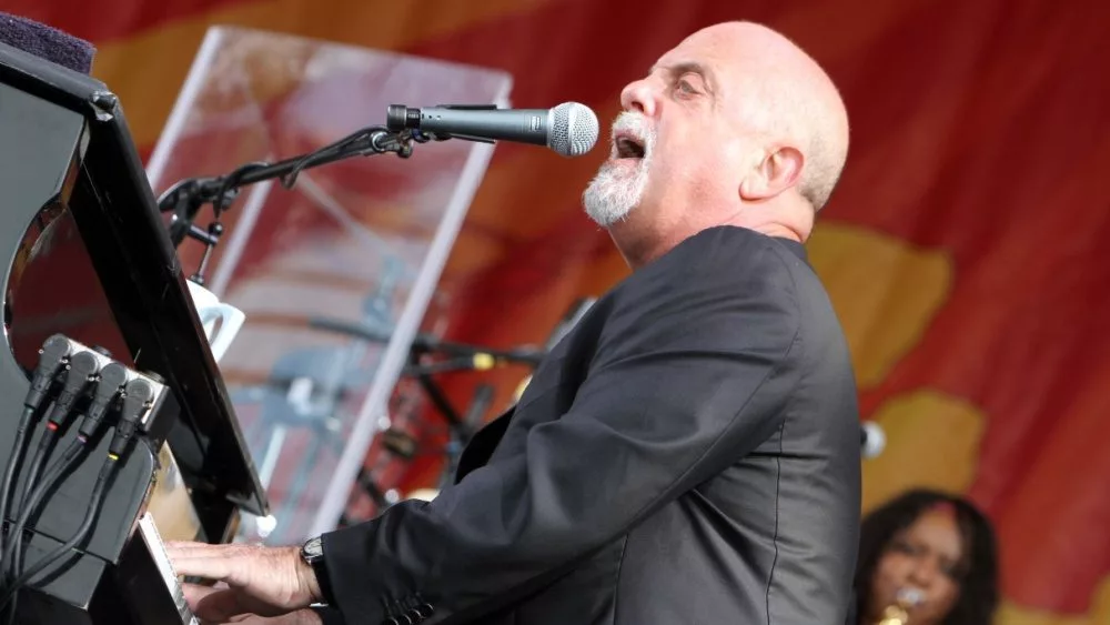 Billy Joel performs on state at the 2013 New Orleans Jazz and Heritage Festival. New Orleans^ Louisiana - April 27^ 2013