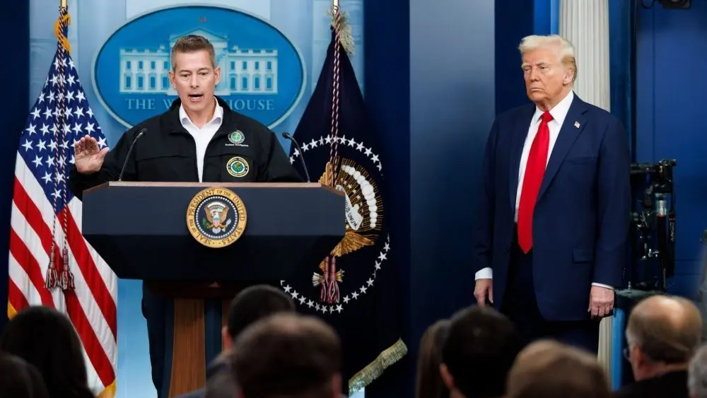 shutterstock_2586171389-1560339 Sean Duffy^ Transportation Secretary^ speaks at a White House press briefing. Pres. Donald Trump also pictured