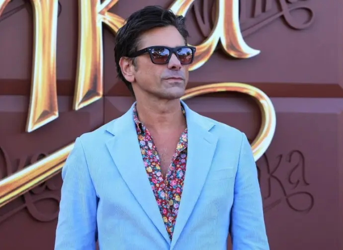 John Stamos at the Wonka Los Angeles Premiere at the Village Theater on December 9^ 2023 in Westwood^ CA