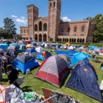 Pro-Palestinian protesters gathered at an encampment at the University of California^ Los Angeles (UCLA)^ on Friday^ April 26^ 2024^ in Los Angeles.