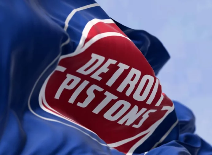 Detroit Pistons flag waving on a clear day. American professional basketball team^ Central Division of the Eastern Conference. Illustrative editorial 3d illustration render