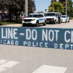 POLICE LINE DO NOT CROSS sign courtesy of the Chicago Police Department. Chicago - Circa May 2021