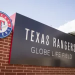 MLB Baseball Texas Rangers' Globe Life Field entrance with flag. Arlington^ TX - March 30^ 2022