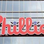 A sign for the MLB Philadelphia Phillies. Philadelphia^ Pennsylvania - April 6^ 2024