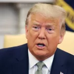 President Donald Trump talks to journalists at the Oval Office at the White House March 12^ 2020 in Washington^ DC.