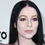 Michelle Trachtenberg walks the red carpet at the Elton John AIDS Foundation Party on February 09^ 2020 in Los Angeles^ California. LOS ANGELES^ CA / USA - FEBRUARY 09^ 2020