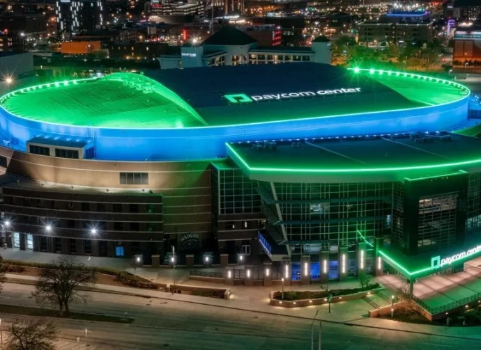 High angle drone view of Paycom Center at night in downtown Oklahoma City. Oklahoma City^ Oklahoma USA - April 14^ 2022