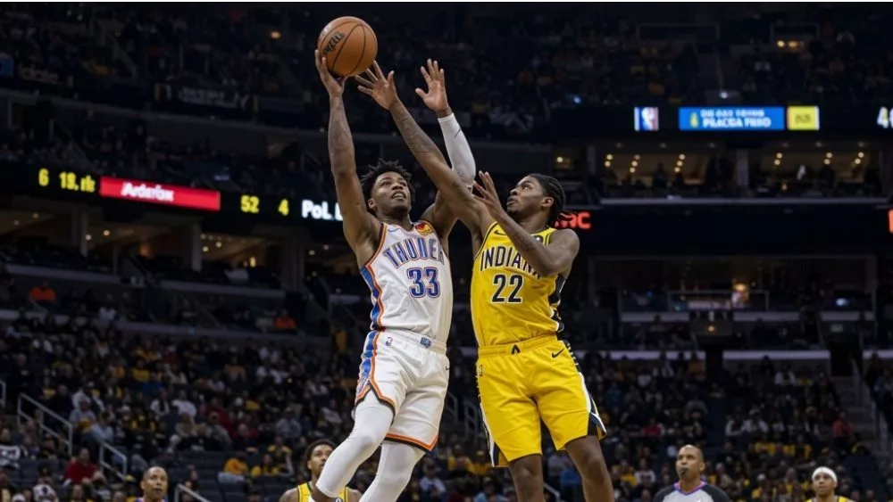 Realistic photography of two basketball players fighting in the air to catch the ball falling after a failed shot in an nba game. one basketball player is from the oklahoma city thunder and the other basketball player is from the indiana pacers. the photo