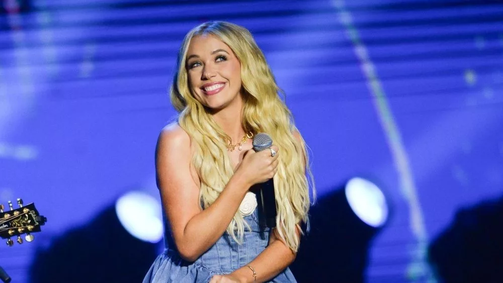 Megan Moroney performs in Hollywood^ Florida on November 14^ 2024. The performance was part of Audacy’s Stars and Strings benefit concert. Hollywood^ Florida - November 14^ 2024: