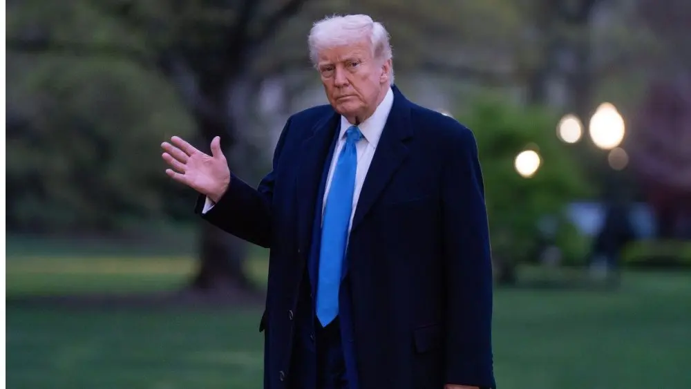 President Donald Trump walks across the south lawn after stepping off Marine 1 Washington DC^ United States^ April 6 2025