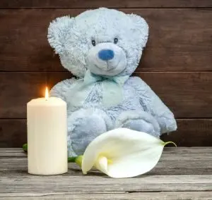 1753544444-330446_teddy_bear_candle_memorial_stock