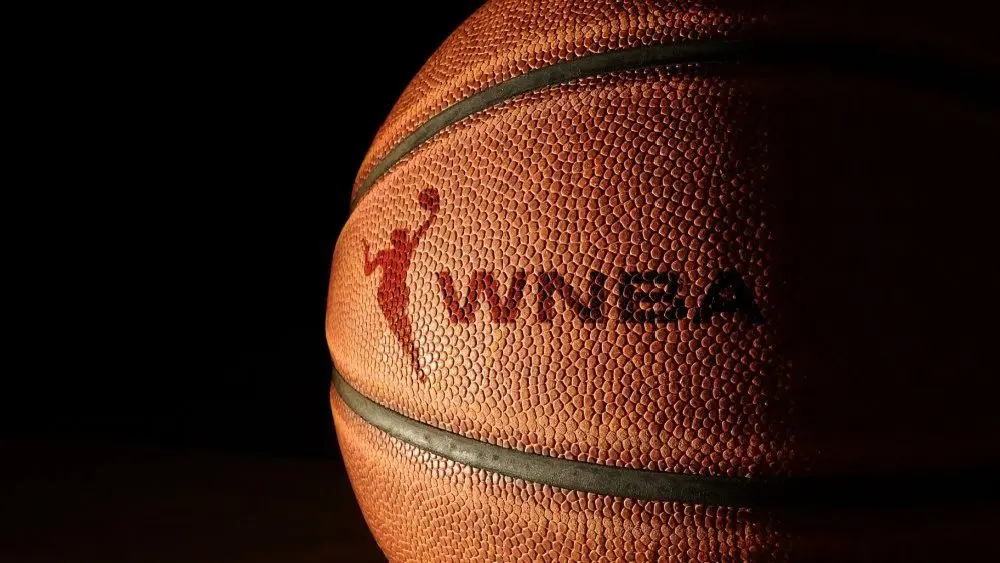 Closeup of a basketball with the WNBA logo and text Raleigh^ NC - USA - 06-13-2024