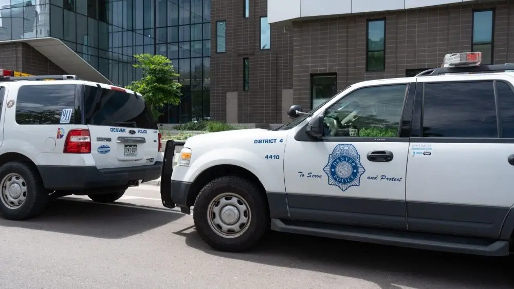 Law Enforcement Downtown Denver^ Denver Police Department cars parked Denver^ Colorado^ United States - 5.17.2023