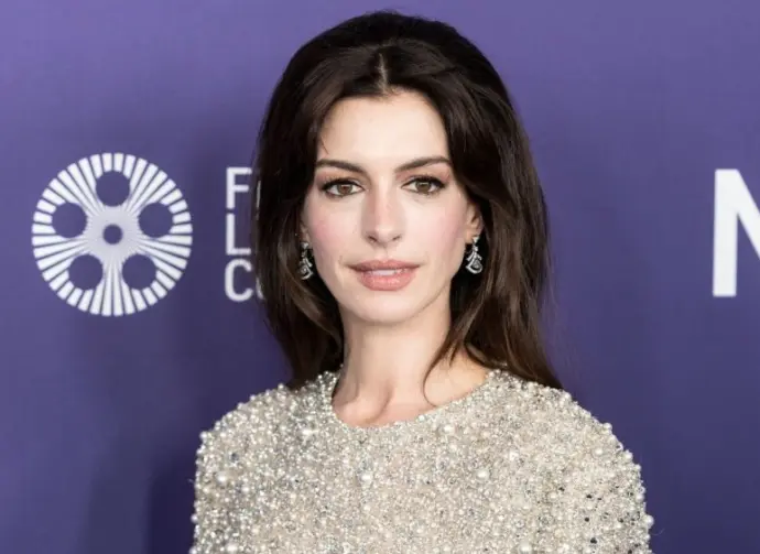 Anne Hathaway wearing dress and shoes by Valentino attends presentation of movie Armageddon Time during 60th New York Film Festival at Alice Tully Hall on October 12^ 2022