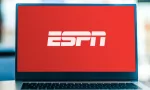 Laptop computer displaying logo of ESPN