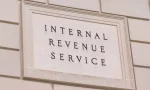 Internal Revenue Service sign at the IRS Building in Washington^ DC. WASHINGTON^ DC - MARCH 14^ 2018