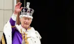 King Charles III on the balcony of Buckingham Palace following the Coronation at Westminster Abbey on May 6^ 2023 in London^ England