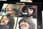 'Let it Be' album from The Beatles. This music album is on a vinyl record LP disc. Album cover
