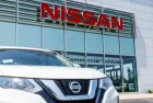 New vehicles at a Nissan Car and SUV Dealership. Nissan is part of the Renault–Nissan Alliance VII