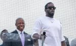 Sean "Diddy" Combs speaks and performs to the crowd after being presented with the key to the city by Mayor Eric Adams on Times Square in New York on September 15^ 2023