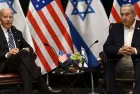 US President Joe Biden (L) listens to Israel's Prime Minister Benjamin Netanyahu as he joins a meeting of the Israeli war cabinet in Tel Aviv on October 18^ 2023