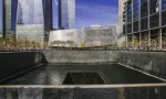 9/11 Memorial at World Trade Center Ground Zero in New York City. NEW YORK^ USA - APRIL 15^ 2016